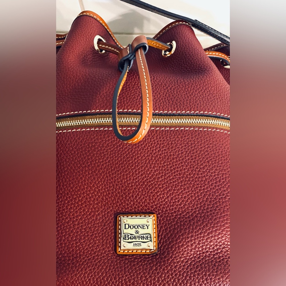 Dooney & Bourke Burgundy Pebbled Leather Drawstring Shoulder Bag with Tan Trim - Picture 10 of 16